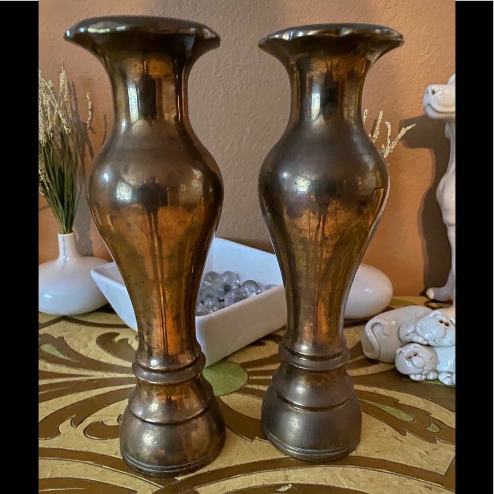 An amazing pair of vintage brass vases